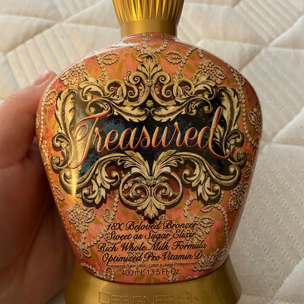Designer skin treasured tanning lotion